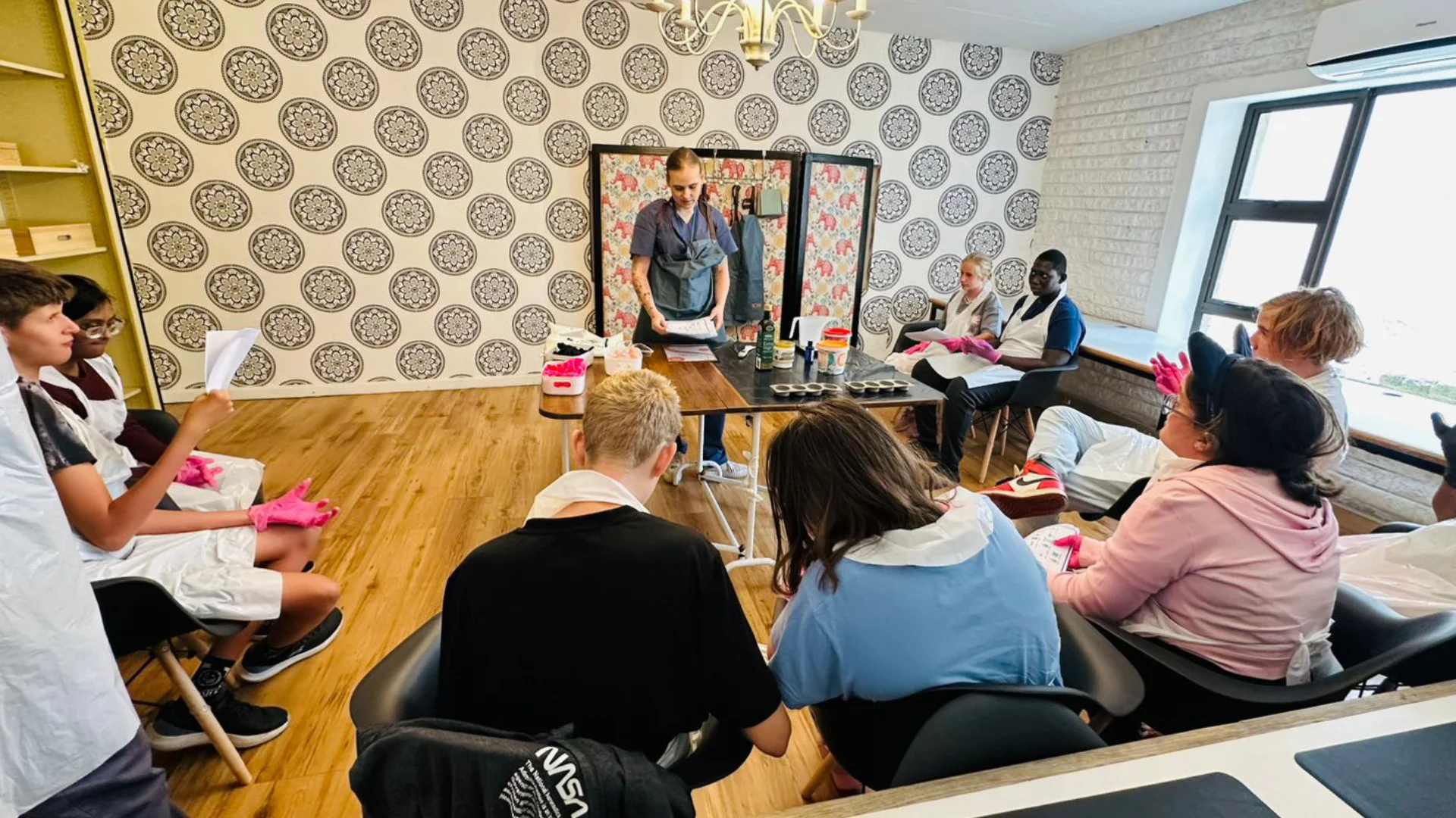 Learners watching a Luxury Soap Making demonstartion