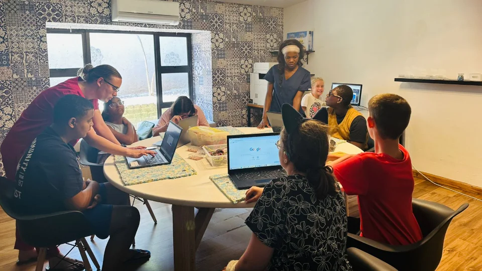 Special needs teenagers learning about code